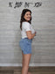 Z Mid-Rise Raw Hem Light Wash Denim Shorts