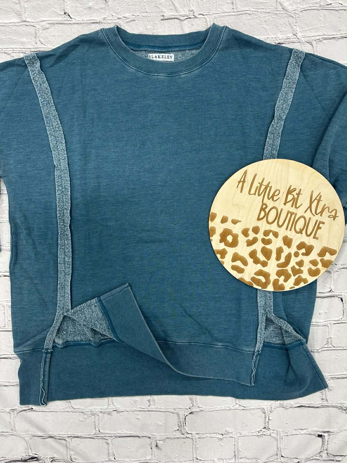 EXPOSED SEAM BLUE SWEATSHIRT