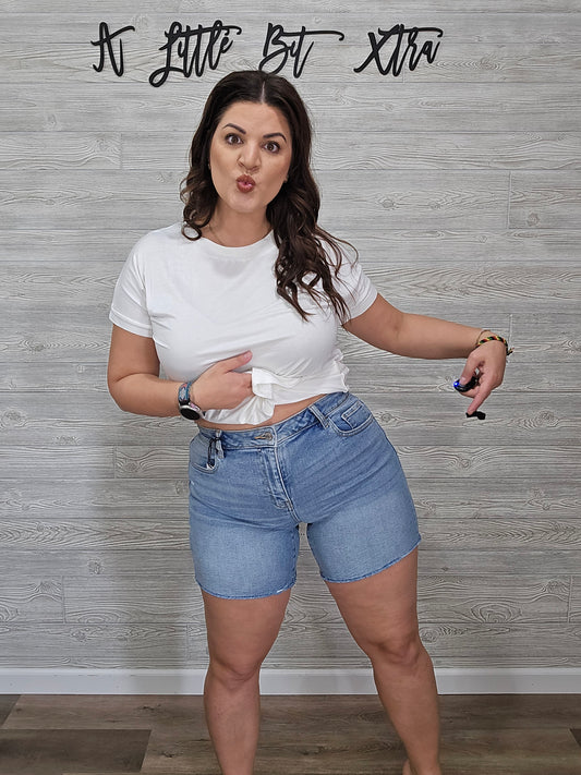 Z Mid-Rise Raw Hem Light Wash Denim Shorts